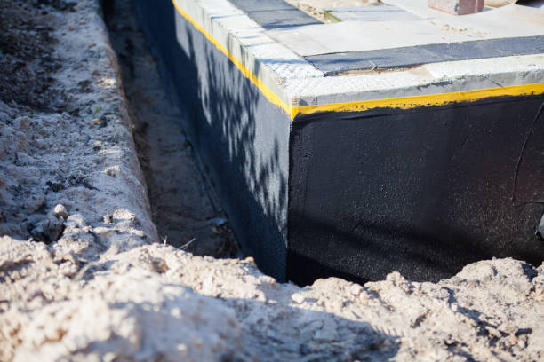 Professional Waterproofing technician working in Hamilton, IL